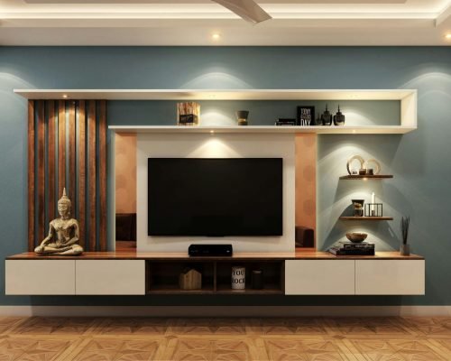 Elegant minimalist living room with TV, decorative shelves, and Buddha statue for serene ambiance.